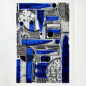 The image shows an abstract art print with a geometric design, featuring a combination of black, white, and deep blue shapes. The artwork includes various forms such as circles, rectangles, and lines, arranged in an intricate and structured pattern. The bold use of blue contrasts sharply with the black and white elements, creating a visually compelling composition. The art is displayed on a white background, emphasizing the crispness of the design.